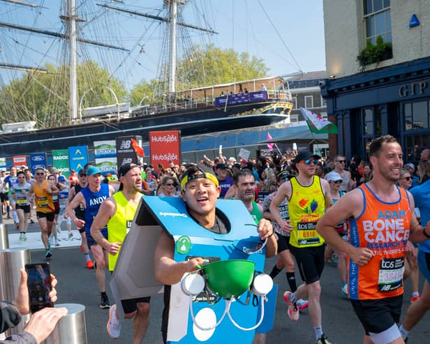Man runs marathon dressed in Domino's Pizza box