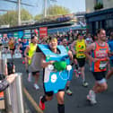 Man runs marathon dressed in Domino's Pizza box