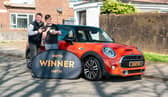 Andrew Heal woke up to see a familiar face at the door - and then he was given a massive prize