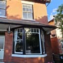 Period frontage with original bay windows and decorative brickwork