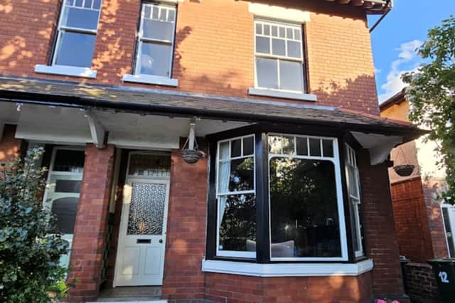 Period frontage with original bay windows and decorative brickwork