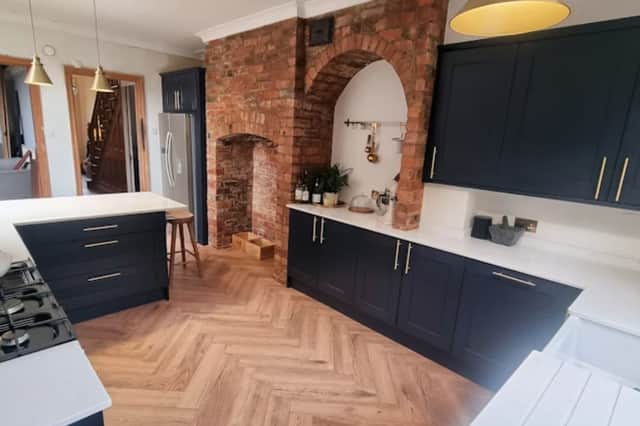 Bright modern kitchen with quartz worktops and integrated appliances