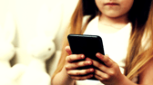 As more children get smartphones at a younger age, parents face growing pressure to strike a balance between independence and online safety