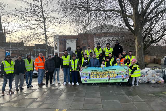 Photo shows young people in Sheffield starting 2026 by cleaning up the city's streets