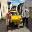 Brothers Alex and John Riddle dressed as Del Boy and Rodney for a school prom - complete with a battered Reliant three wheeler van