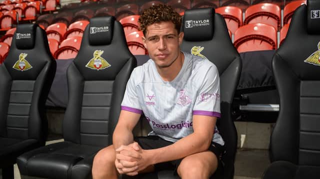Josh Clarke has become Doncaster Rovers' seventh signing of the summer transfer window.