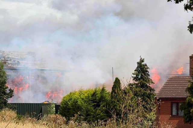 Seven fire engines deal with farm blaze that involves thousands of tonnes of winter hay feed in Doncaster.