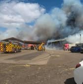 Seven fire engines deal with farm blaze that involves thousands of tonnes of winter hay feed in Doncaster.