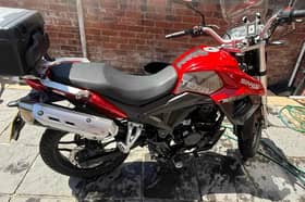 Stolen was a red Sinnis Terrain motorcycle.