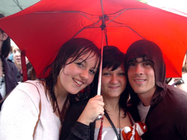 The rain fails to deter these fans at the main stage at Doncaster Live 2006. 
