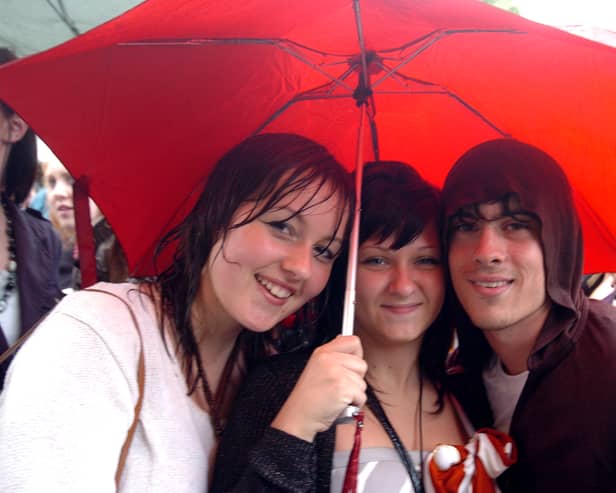 The rain fails to deter these fans at the main stage at Doncaster Live 2006. 