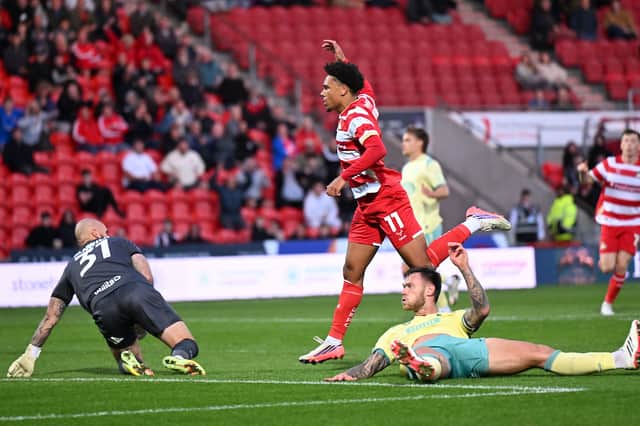 Summer signing Leon Ayinde finds the net with his first goal for Doncaster Rovers.