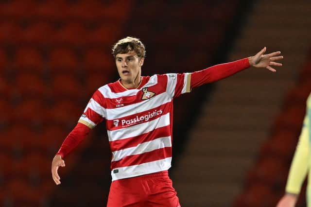 Jonny Tomlinson made his professional debut for Doncaster Rovers in the EFL Trophy