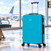 FLYMAX 29-inch 100-litre hard-shell suitcase in aqua.