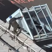 Video showed the man smashing glass panels on a canopy over the Outpatients department at DRI.