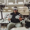 Prof David King demonstrates telexistence technology at the University of Sheffield AMRC.