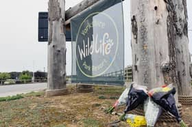 Floral tributes have been laid at the entrance to Yorkshire Wildlife Park.