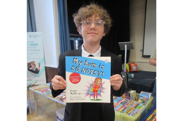 Pupil Ryan at the book fair