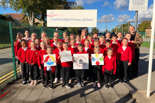 Children from across school pictured with headteacher Amanda Painter and  assistant headteacher Laura Slack