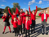 Children from Tickhill Estfeld School celebrating their latest Ofsted report