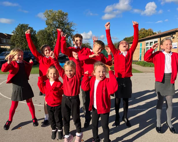 Children from Tickhill Estfeld School celebrating their latest Ofsted report