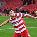 Owen Bailey helped Doncaster Rovers to a fantastic win over South Yorkshire rivals Sheffield Wednesday.
