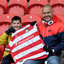 Doncaster Rovers were cheered on to a derby day victory in front of a bumper crowd.