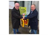 Irwen Martin (right) presents bleed control kits to Howard Rimmer, Reform UK leader on City of Doncaster Council.