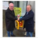 Irwen Martin (right) presents bleed control kits to Howard Rimmer, Reform UK leader on City of Doncaster Council.
