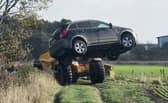 Police removed vehicles from a field.