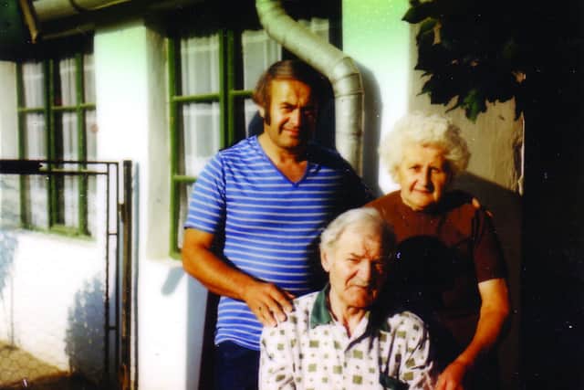John with his paremnts when he eventiually returned to Hungary in the late 60's.
