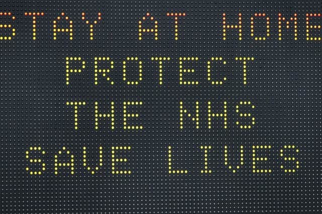A matrix road sign on the A367 into Bath advises motorists to stay at home to protect the NHS and save lives the day after Prime Minister Boris Johnson put the UK in lockdown to help curb the spread of the coronavirus. Photo: Ben Birchall/PA Wire