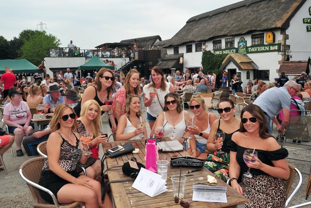Members of the public at the Guys Thatched Hamlet Canalside Gin Festival