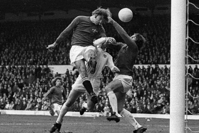 David Harvey punches clear while under pressure against Chelsea at Elland Road in February 1974. The game finished 1-1.