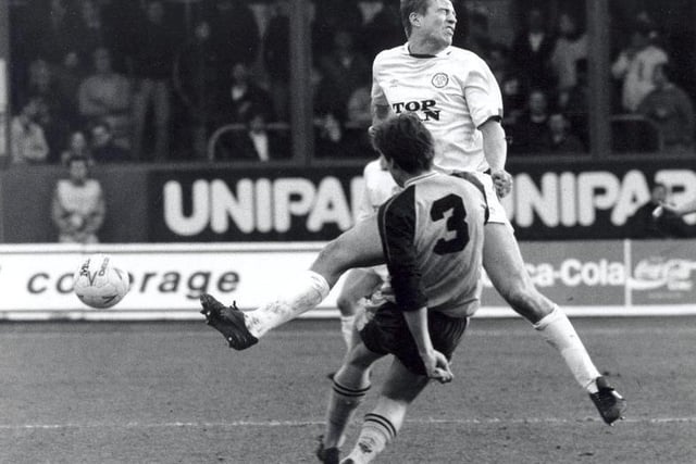 The Whites battled back from a 2-0 half time deficit to win at the Manor Ground. Here Lee Chapman takes one for the team. Remember the flying Leeds United fan?
