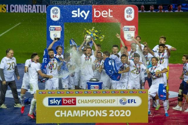 Leeds lift the trophy.
