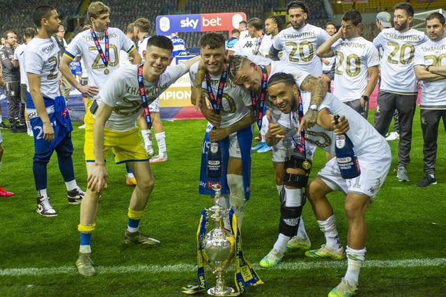 Illan Meslier, Ben White Kalvin Phillips and Tyler Roberts with the championship trophy at Elland Road, winning the division and promoted to the Premier League.