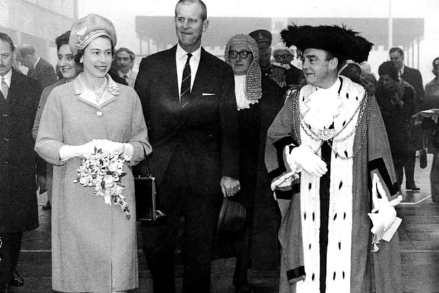 The Queen and Prince Philip with the then Lord Mayor of Leeds, Alderman W. R. Hargrave, at Seacroft Civic Centre in October 1965.