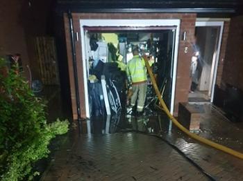 The fire service had to help drain water from the flooded garage at around 4am (August 11)