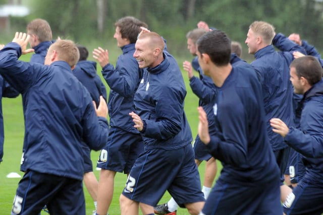 The PNE players warm-up in pre-season training with Jack King in particular enjoying himself