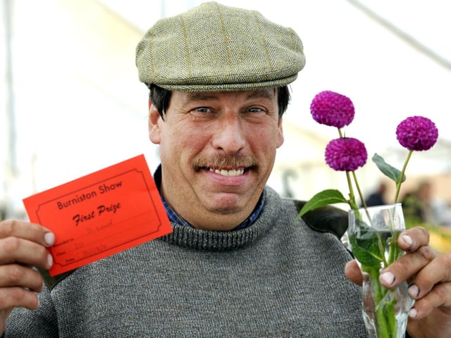 David Ward of East Ayton with his 1st prize Dahlias.