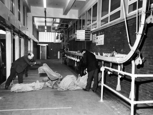 The inward loading platform. Bags of mail collected from posting boxes are attached to a chain conveyor which carries them up into the mechanised letter office.