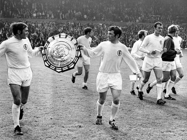 Terry Cooper and John Giles parade the Charity Shield after Leeds United beat Manchester City 2-1 at Elland Road in August 1969.