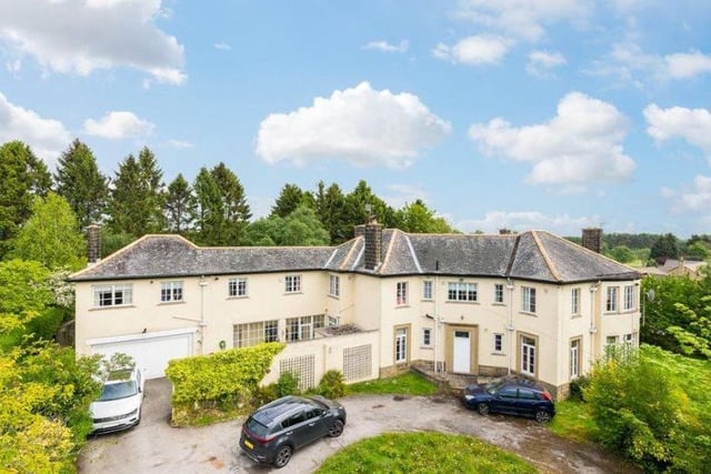 This seven-bedroom property contains a separate self-contained apartment and backs onto Sandmoor Golf Course.
