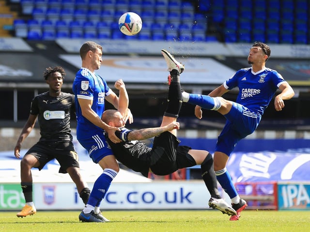 Joe Garner 6 - Close to scoring a marvellous goal and led the line well