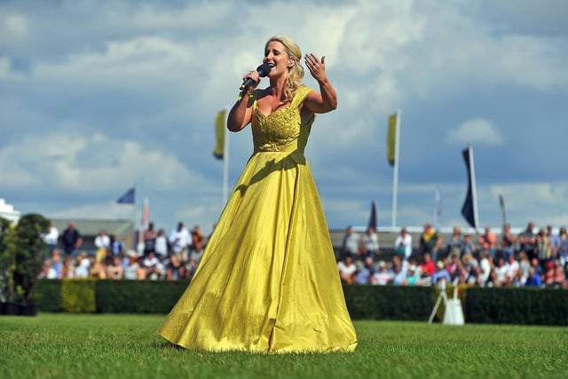 Lizzie Jones is a rugby league heroine and inspirational Halifax mum-of-two, who was awarded an MBE at Buckingham Palace this year. The sporting soprano Mrs Jones, 35, was awarded the MBE (Member of the Order of the British Empire) for services to Rugby League and charity, after founding the Danny Jones Defibrillator Fund - set up in 2015 following the untimely death of her husband. Twitter: @LizzieJonesuk