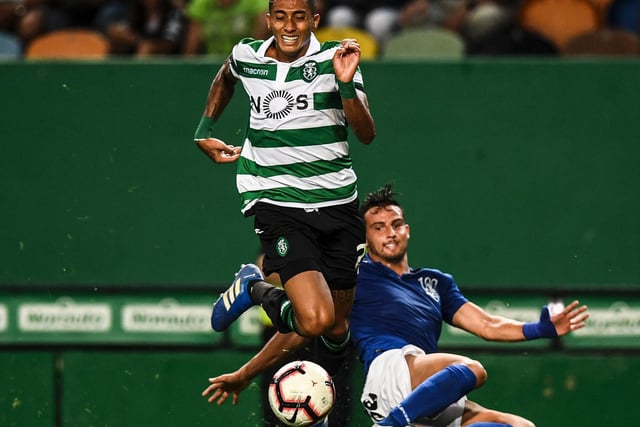 SEE YA! Racing away from Feirense's Portuguese forward Luis Machado for new club Sporting Lisbon in September 2018. Photo by PATRICIA DE MELO MOREIRA/AFP via Getty Images.