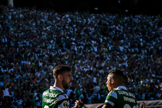 CROWDS: Alongside Bruno Fernandes, now of Manchester United, after scoring during the Portugal's Cup final against Porto in May 2019. Photo by PATRICIA DE MELO MOREIRA/AFP via Getty Images.