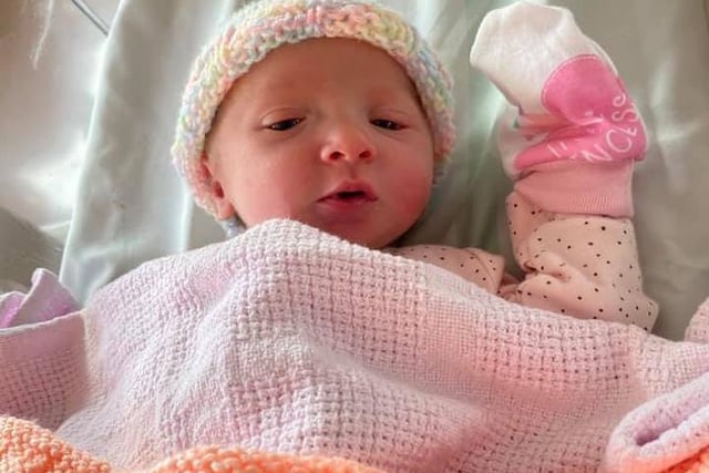 Nice hat! Aurora weighed 7lb 1oz when she was born on September 19, 2020 at Blackpool Vic. Thanks to dad Nathan for sharing.