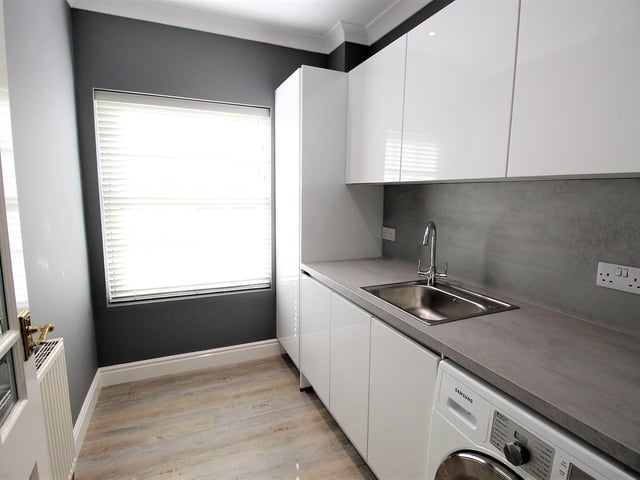 The utility room is as bright as the rest of the property.